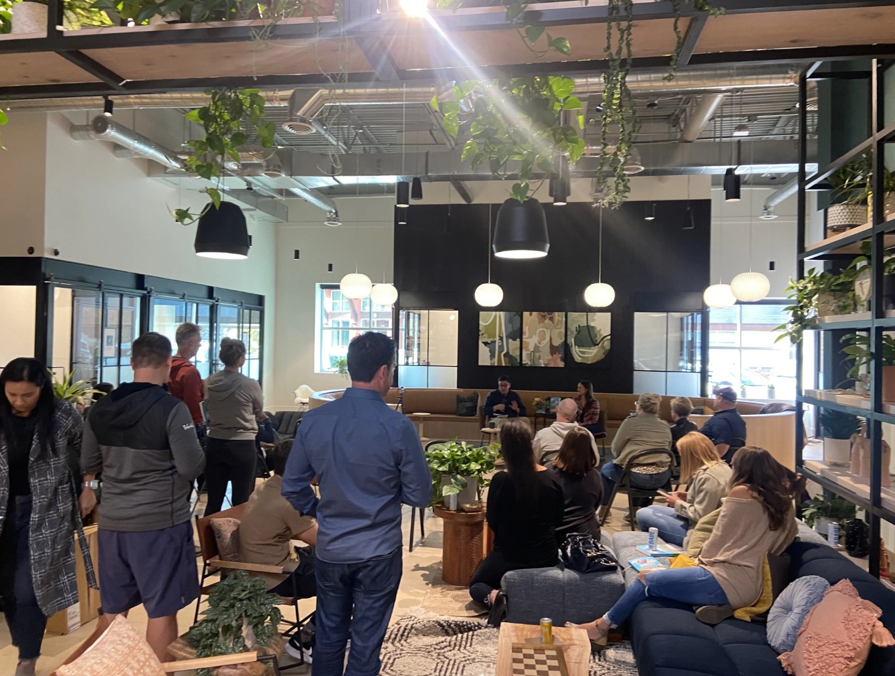 Kiln community event with people gathered inside the workspace
